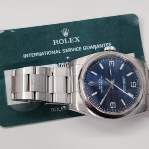 Rolex Oyster Perpetual 36 W/Service Card Rolex Oyster Perpetual 36 mm Blue Dial Watch 116000 Mixed Serial Rehaut Engraved With Service Card