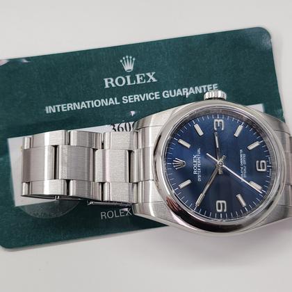 Rolex Oyster Perpetual 36 W/Service Card Rolex Oyster Perpetual 36 mm Blue Dial Watch 116000 Mixed Serial Rehaut Engraved With Service Card