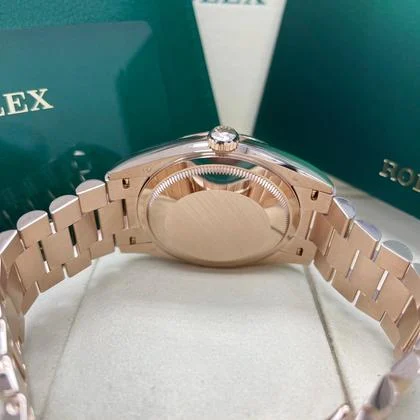 Rolex Day-Date 36 UNWORN 128235 Day-Date 36mm Green Olive Roman Dial President Bracelet Rose Gold Full Set Unworn Complete Box & Papers - Image 2
